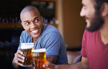 Friends, man and happiness in pub with beer for happy hour, relax or social event with cheers. Diversity, people and drinking alcohol in restaurant or club with smile for bonding and celebration