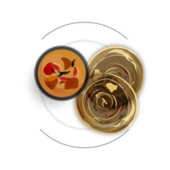 Top view of roti canai with curry sauce.