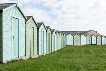 Fototapeta na wymiar Blue and green beach huts