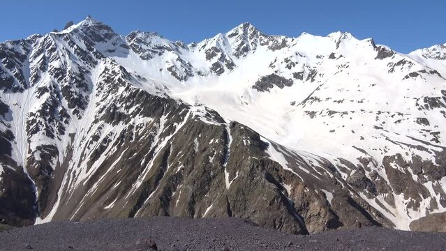 The mountains of the main Caucasian ridge on a sunny cloudless day. Kabardino-Balkaria, Russia