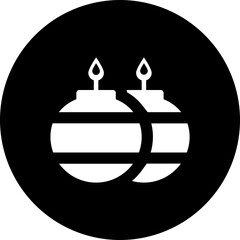 Burning round candles glyph icon or symbol.