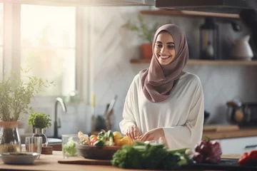  A woman in a kitchen, surrounded by fresh produce and cooking ingredients. © shelbys