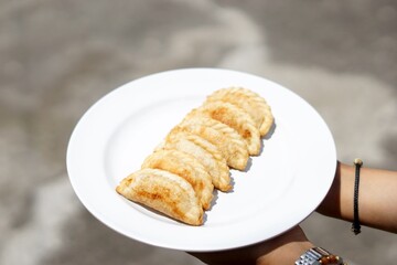 Cireng is a tasty West Javanese snack crafted from tapioca flour, deep-fried, and typically enjoyed with a zesty dipping sauce.