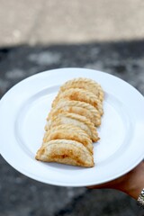 Cireng is a tasty West Javanese snack crafted from tapioca flour, deep-fried, and typically enjoyed with a zesty dipping sauce.