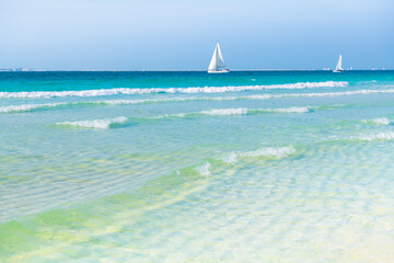 Beautiful beach with white sand and turquoise water. Dubai, United Arab Emirates.