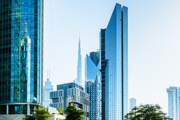 Dubai downtown skyline with modern skyscrapers at sunny day. Dubai, United Arab Emirates.