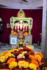 Rose Flowers in front of Lord Ram Statue in Temple. Flowers Garland. Ramayana.  Lakshman. Goddess Sita. Shri Ram. Ram Navami