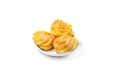 Soes Cake also known as Choux Pastry displayed on a plate