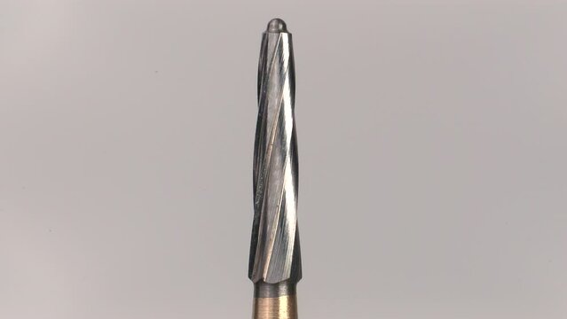 horizontal 4k video taken with Sony A7iii camera, with Sigma 105mm macro 1.5x magnification. Tungsten dental bur dentist