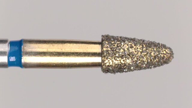Vertical video taken with Sony A7iii camera, with Sigma 105mm macro 1.5x magnification. Diamond dental bur dentist.