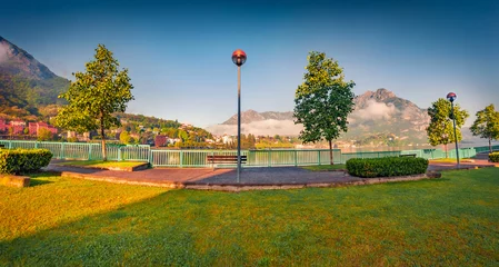 Foto op Aluminium Panoramic summer view of public park of Lecco town with Resegone peak on background, Italy, Europe. Colorful morning scene of Como lake in Italian Alps. Traveling concept background. © Andrew Mayovskyy