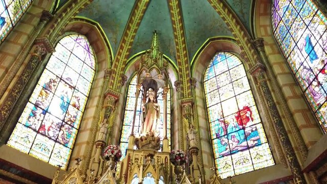Stained glass and vaulted ceiling of a historic cathedral in Quito, Ecuador, showcasing art and architecture