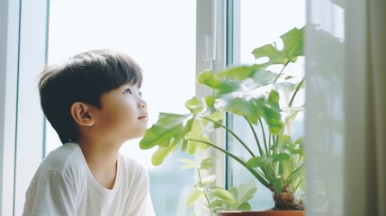 A Young Child Looking Out the Window at a Green Plant. Fictional Character Created By Generated By Generated AI. - obrazy, fototapety, plakaty