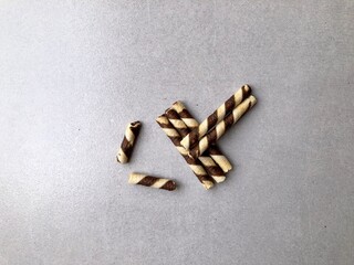 Chocolate wafer stick on the floor