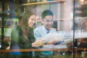 Asian business people meeting in a coffee shop.