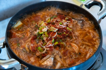 View of the boiling saury stew in the pot