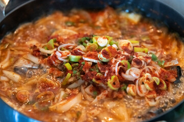 View of the boiling saury stew in the pot