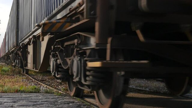 wheels of a freight train on rails