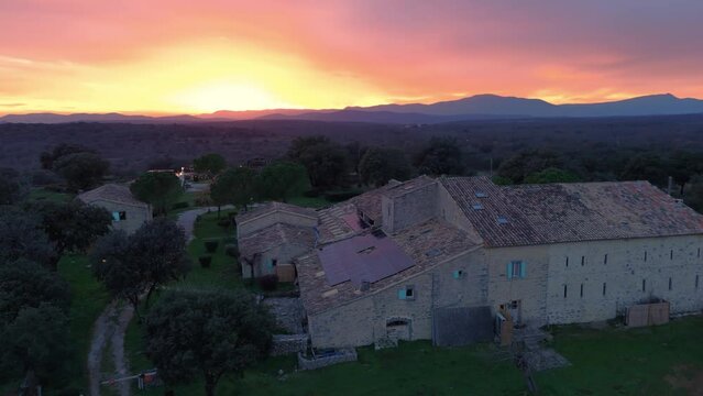 Sunset over Mas at Pic Saint-Loup in Languedoc-Roussillon - aerial panoramic