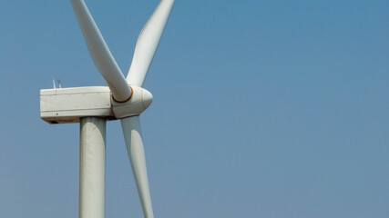 Wind farm or wind park, with high wind turbines for generation electricity, Green ecological power...