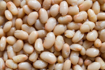 Boiled canned beans. The texture of beans. Close-up of pickled beans.