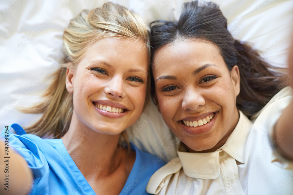 Poster Smile, portrait and selfie of friends on bed for relax, fun or influencer post on social media. Happy, people and face of women in house for bonding, connection or memory of vacation together