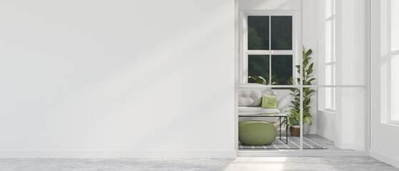 A modern home corridor in front of a living room features a white wall.