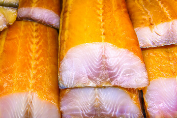 Balyk from smoked sevruga or sturgeon in selective focus on a market counter.Source of Omega-3 Fats.