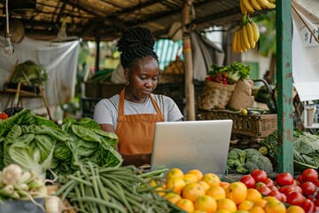 Portrait of a Black Female Running a Street Vendor Food Stand with Fresh Organic Agricultural Products. Farmer Using Laptop Computer to Manage Business Operations, Online Orders and Marketing Campaign