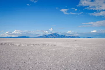 Fotobehang Empty Salt Flats and Distant Mountain, Clear, Blue Sky - Salar de Uyuni, Bolivia  © JK-A