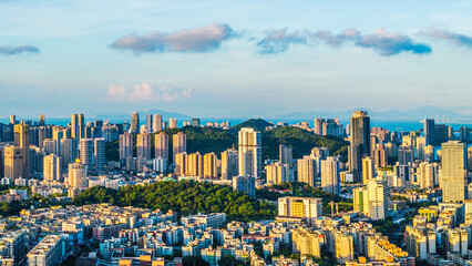 Aerial view of Zhuhai city skyline and modern buildings scenery at sunset, China.