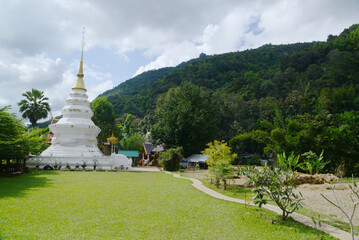 White Pagoda is a large outdoor prominently in the middle of the rice field Inside Wat Nakhuha there are beautiful natural places. Located at Phrae Province in Thailand.