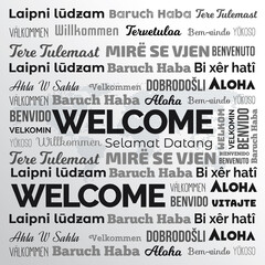 Multilingual "Welcome" typography design on a white background