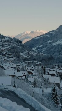 Winter view of the Swiss Alps valley, featuring the charming village of Champery.