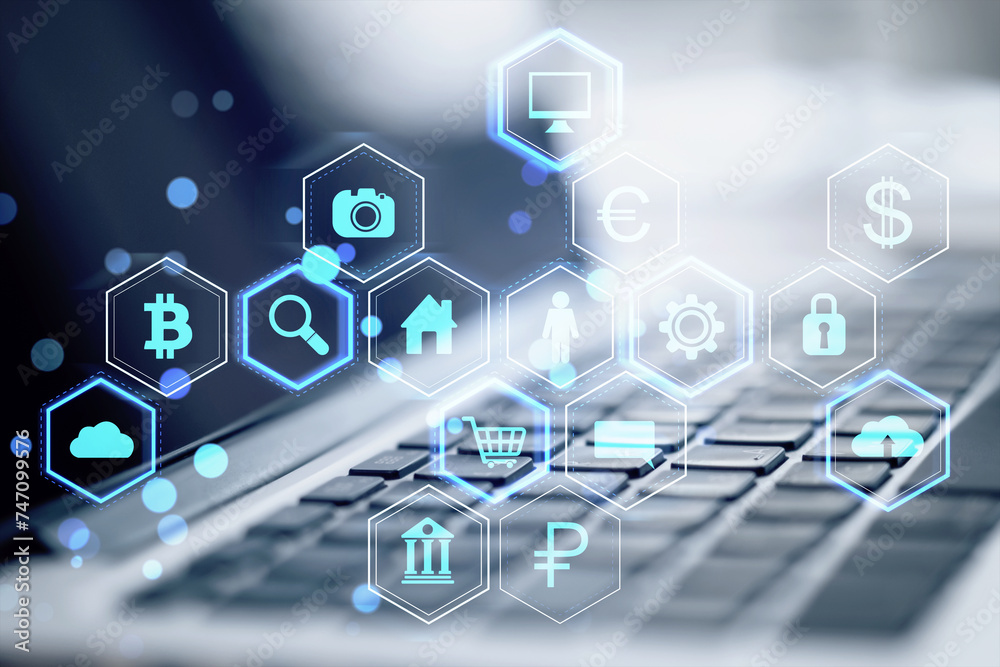 Poster Close up of laptop keyboard on desk with abstract hexagonal pattern hologram with various business icons on blurry background. Digital dashboard and data concept. Double exposure.