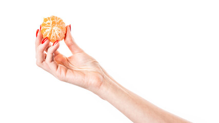Tangerine in hand isolated on white background.
