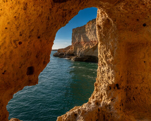 Limestones caves facing the Atlantic ocean, Algar seco cliffs, Carvoeiro, Lagoa, Algarve, Portugal.