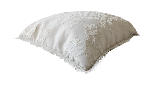  A modern cushion featuring a sophisticated lace-like motif, placed elegantly on a sleek, Transparent background