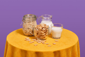 Various types of breakfast cereals and fresh milk. Healthy products with vitamins.
