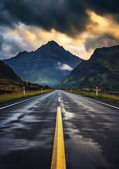 Road to mountain with heavy clouds.