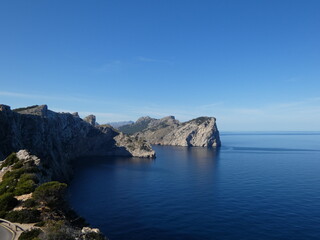 Fototapeta na wymiar Scenic view of blue ocean water and rocky cliff coast