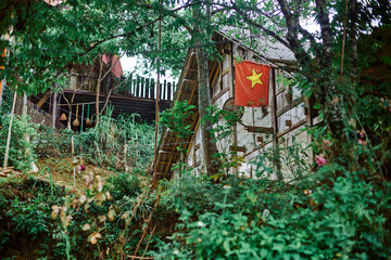vietnamese flag in a village in sapa - 747126181
