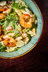 salad with shrimps in bowl