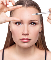 Obraz premium Beautiful woman has an injections in forehead.