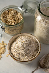 Oat flour and whole oats. Gluten free flour, oats, home baking.