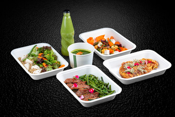 A variety of healthy and delicious meal options in eco-friendly takeaway containers.