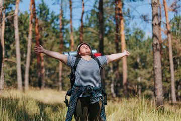 Elevate the Adventure Plus Size Woman Empowering Hike, Raising Hands in Nature Embrace