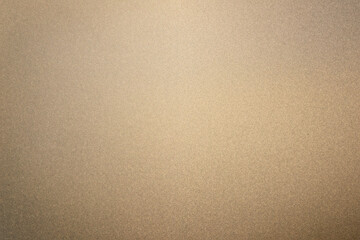 A background of matte gold or gold metal texture.