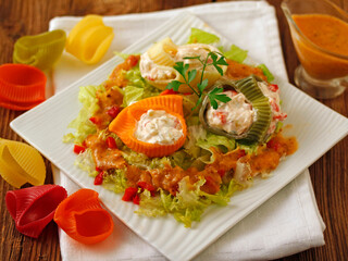 Stuffed pipe rigate with salad.
