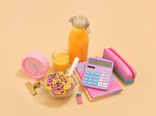 Breakfast cereal and composition of bright office supplies. Workspace and stationery.